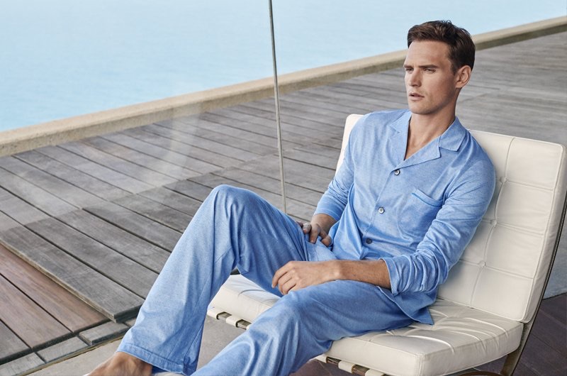 British model Guy Robinson dons luxury pajamas from Derek Rose.