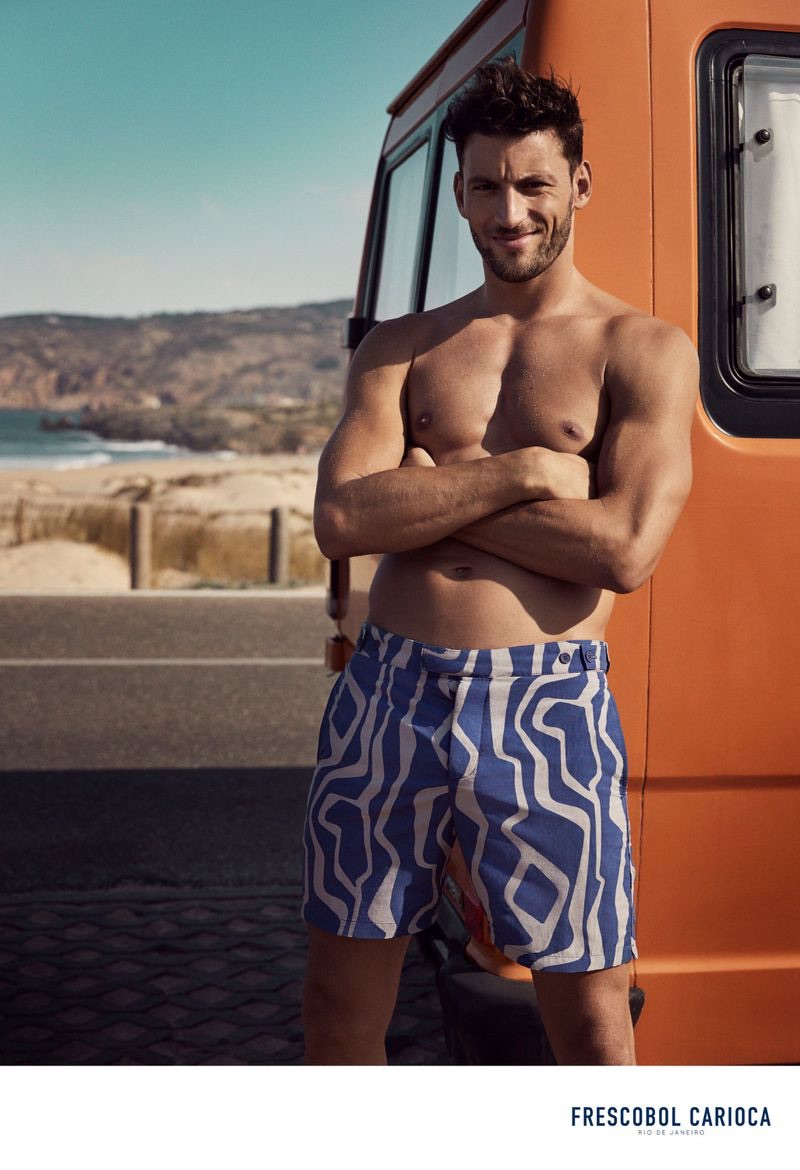 Sporting graphic swim shorts, Kevin Sampaio fronts Frescobol Carioca's spring-summer 2019 campaign.