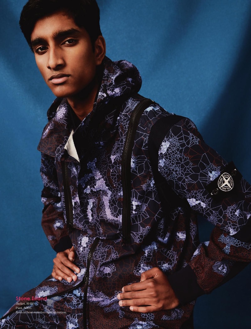 Wearing an all-over print from Stone Island, Jeenu Mahadevan appears in Holt Renfrew's spring 2019 men's catalog.