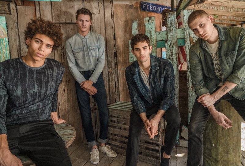 Models Ikce-Wicasa Quiles, Eli Hall, Gordon Winarick, and Mike Russo rock denim from John Varvatos Star USA.