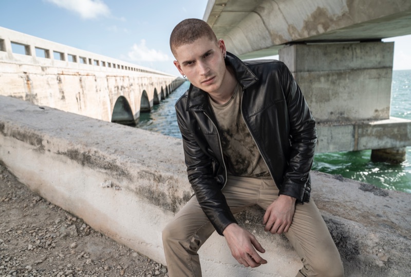 A cool vision, Mike Russo rocks a leather jacket and khaki pants by John Varvatos Star USA.