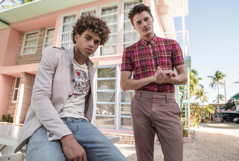 Taking to beachfront property, models Ikce-Wicasa Quiles and Eli Hall showcase spring-summer 2019 style from John Varvatos Star USA.