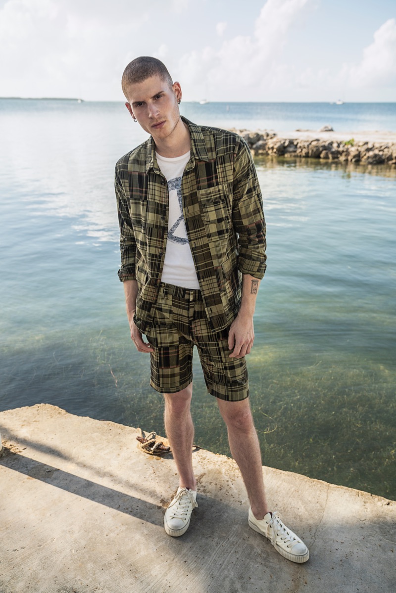 Mad for plaid, Mike Russo sports a matching shirt and shorts from John Varvatos Star USA.