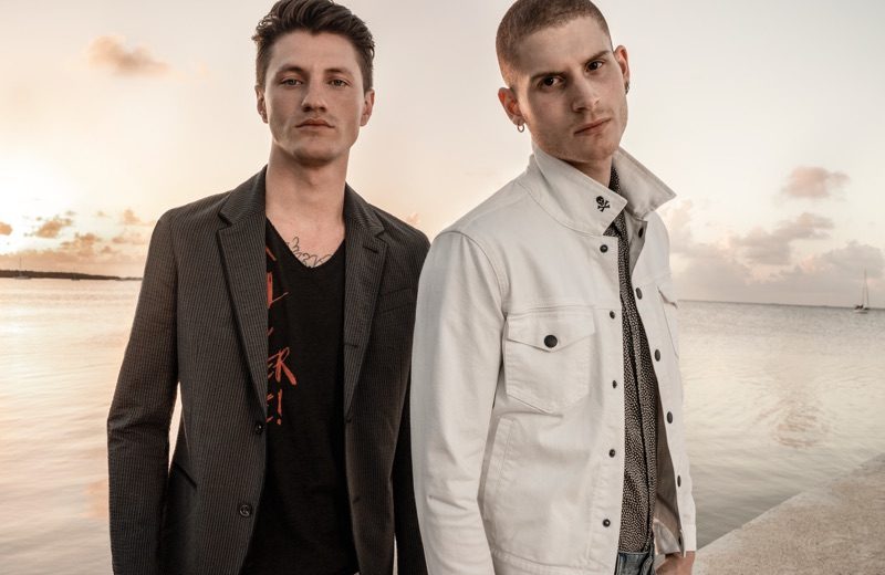 On Island Time: Eli Hall, Mike Russo + More Don Spring '19 Style for John Varvatos Star USA Embracing contemporary style, Eli Hall and Mike Russo wear John Varvatos Star USA.