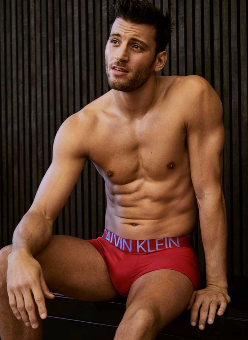 Connecting with Simons, Kevin Sampaio sports red Calvin Klein underwear.