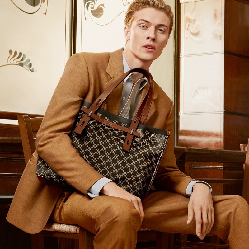 Lucky Blue Smith poses with the Furla Giove bag for the brand's spring-summer 2019 campaign.