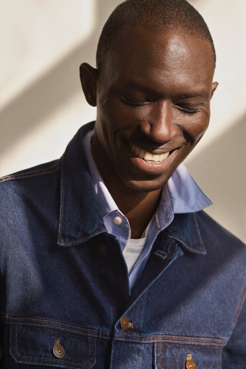 All smiles, Armando Cabral dons denim from Mango.