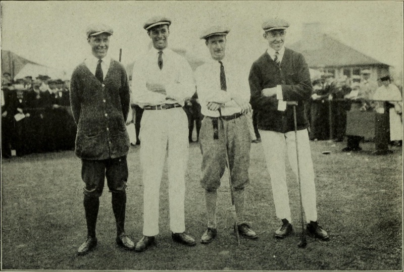 1920s men pose for a photo at a game of golf. The men wear the current golf attire trends of the time with white pants, cardigan sweaters, knickerbockers, and flat caps. » 1920s Men's Fashion Guide: Style of the Roaring Decade 1920s men pose for a photo at a game of golf. The men wear the current golf attire trends of the time with white pants, cardigan sweaters, knickerbockers, and flat caps.