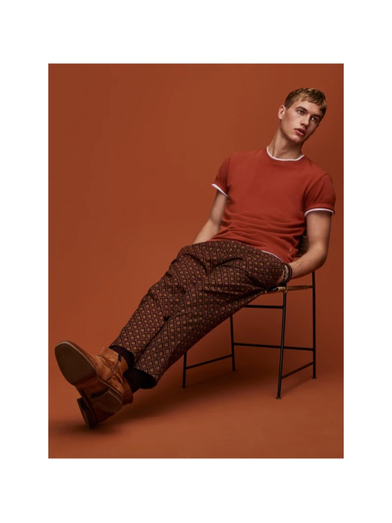 Paul François dons a Scotch & Soda t-shirt with jacquard chinos.