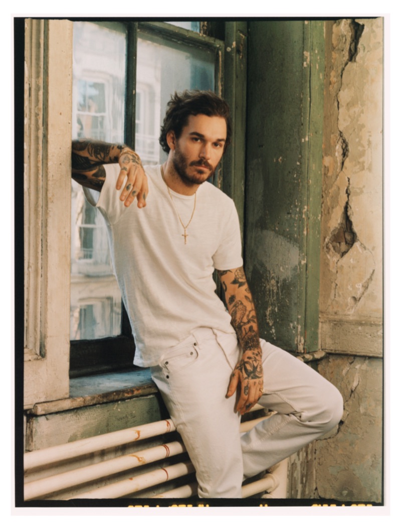 Clad in white, David Alexander Flinn wears Rag & Bone.