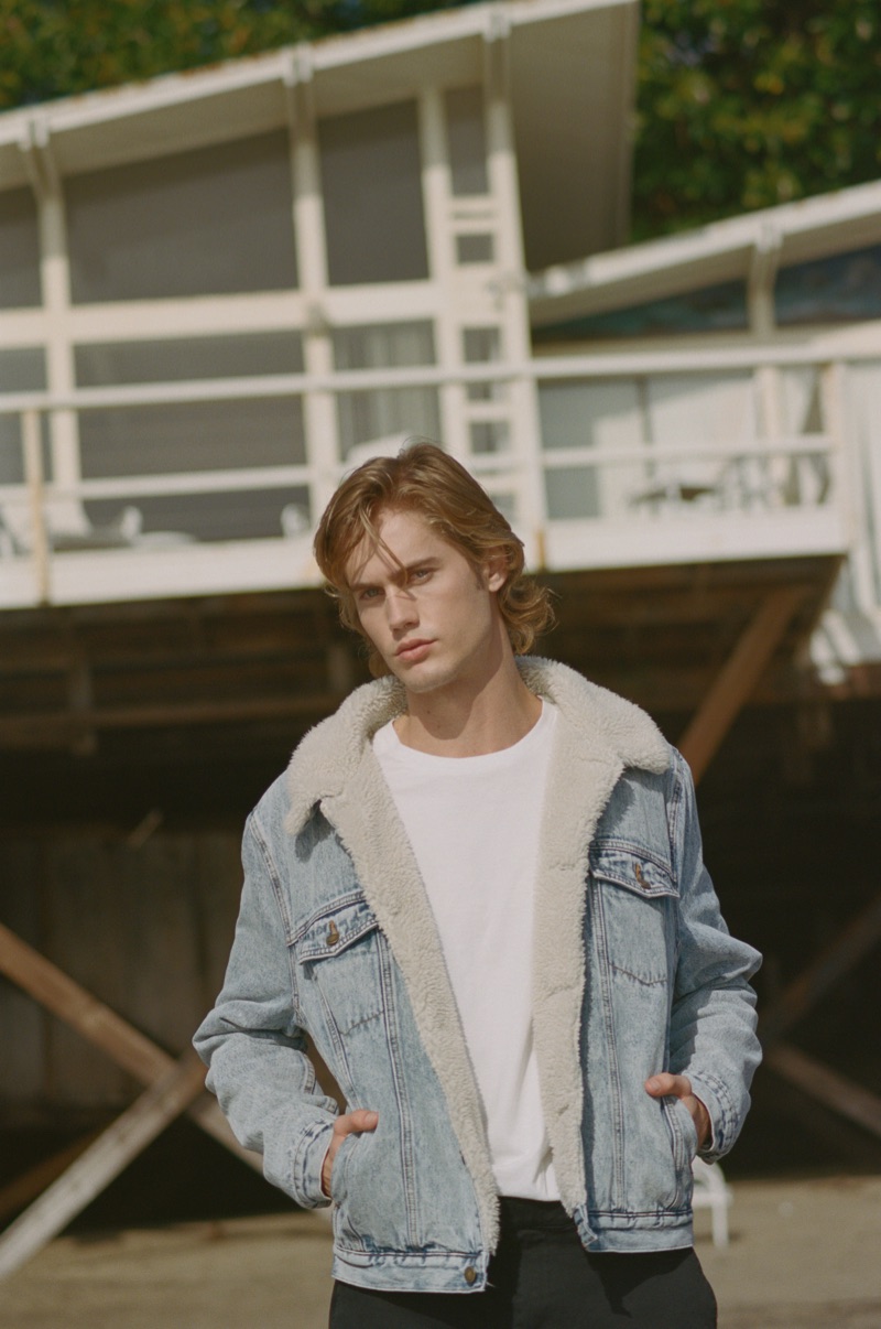 Sporting a denim jacket, Neels Visser stars in Rolla's spring 2019 campaign.