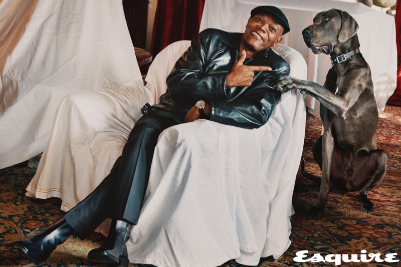 Connecting with Esquire, Samuel L. Jackson dons a leather jacket with a t-shirt, trousers, and boots by Balenciaga.