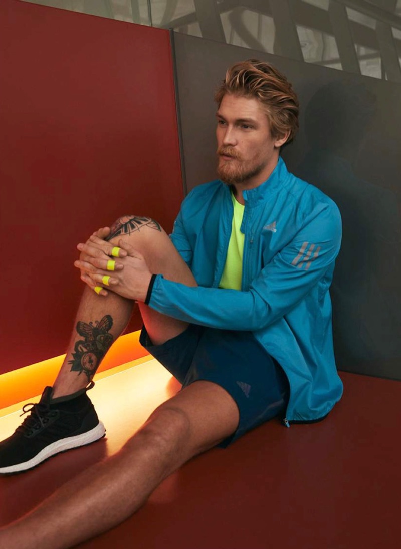 Making a colorful statement in activewear, Harry Goodwins sports Adidas.