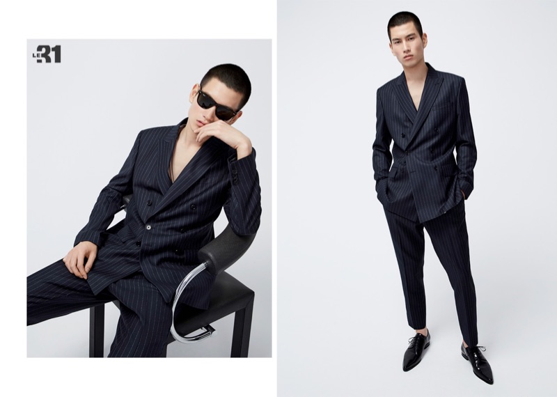 Dashing to say the least, Kohei Takabatake models a pinstripe anti-fit suit from LE 31.