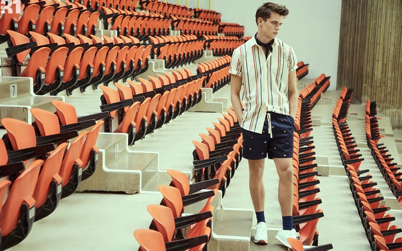 Model Jordy Baan wears a LE 31 striped shirt, shorts, and paisley bandana.