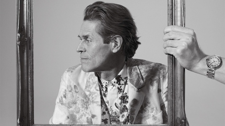 Embracing a floral print, Willem Dafoe wears Dior Men.