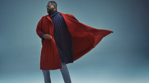 'Us' Star Winston Duke Embraces Fashion-Forward Style for Esquire A smart vision, Winston Duke sports a Homme Plissé Issey Miyake overcoat and coat with Issey Miyake Men trousers.