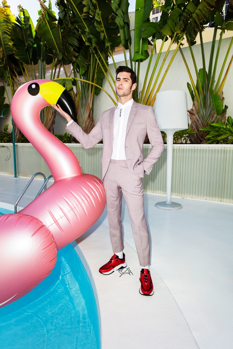René Grincourt dons a suit with sneakers for Wormland's spring-summer 2019 campaign.