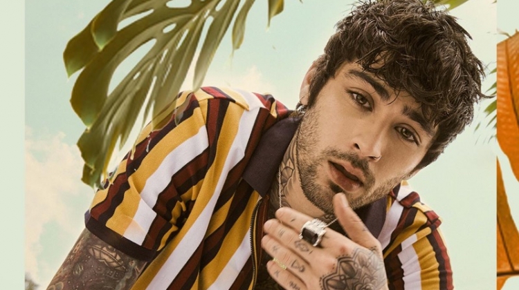 Sporting a striped top, Zayn Malik stars in Penshoppe's spring 2019 campaign.