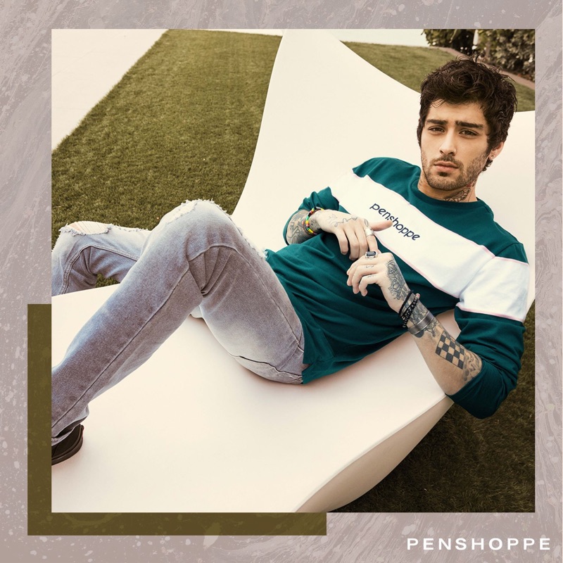 Relaxing, Zayn Malik embraces sporty style for Penshoppe's spring 2019 campaign.