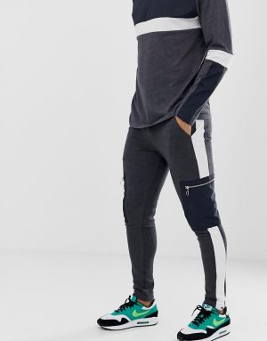 ASOS DESIGN two-piece skinny sweatpants with side stripe and woven cargo pocket in charcoal - Gray ASOS DESIGN two-piece skinny sweatpants with side stripe and woven cargo pocket in charcoal - Gray
