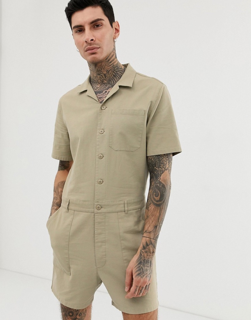 ASOS Design Slim Utility Short Boilersuit in Washed Stone Canvas $72 » One Piece Wonders: 8 Mens Jumpsuit Styles ASOS Design Slim Utility Short Boilersuit in Washed Stone Canvas $72