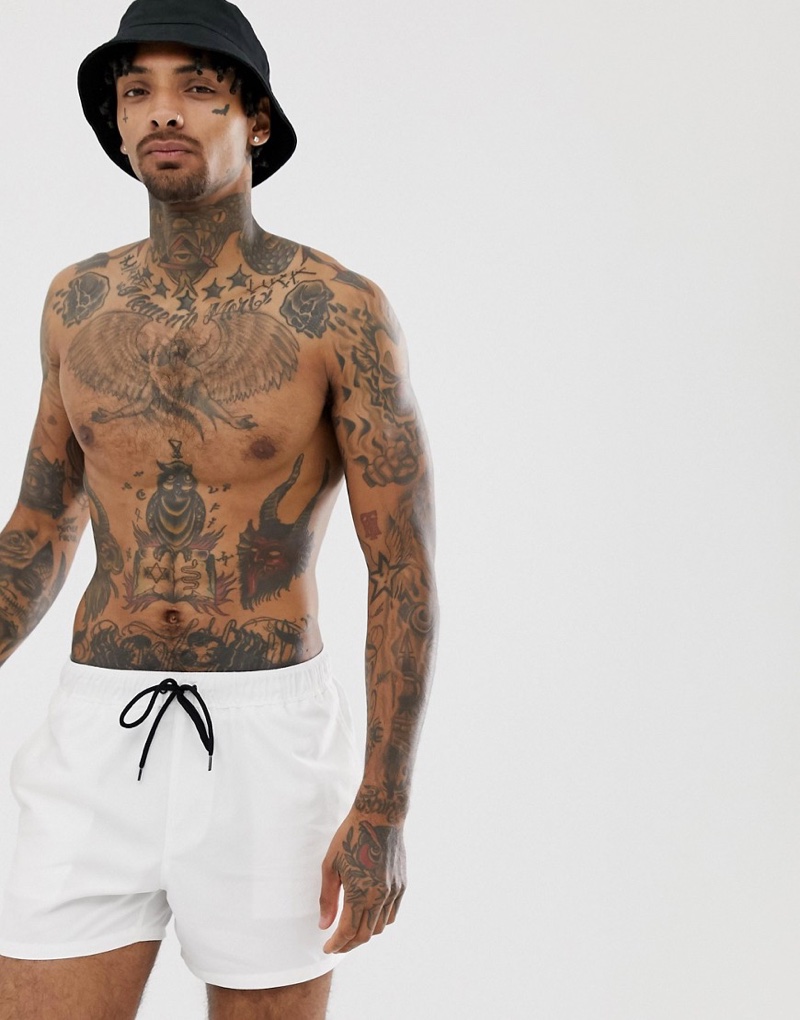 ASOS Design Swim Shorts in White $19 » All White Outfits for Men: The Essential Style Guide ASOS Design Swim Shorts in White $19