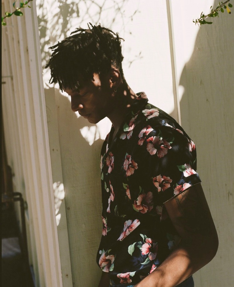 Ty Ogunkoya models a floral print shirt for Abercrombie & Fitch's spring 2019 digital campaign.