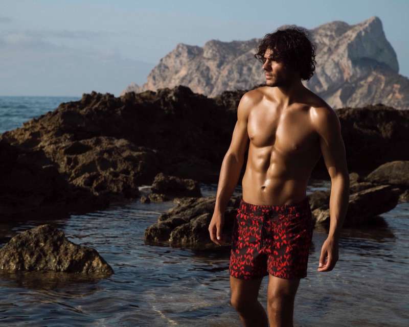 Model Matteo Cupelli appears in Azzaro Paris' spring-summer 2019 swimwear campaign.