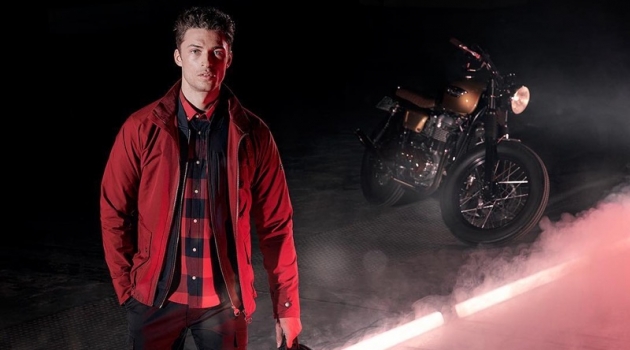 Harvey Haydon Embraces Biker Style in Barbour International Harvey Haydon sports a red jacket from Barbour International's spring-summer 2019 collection.
