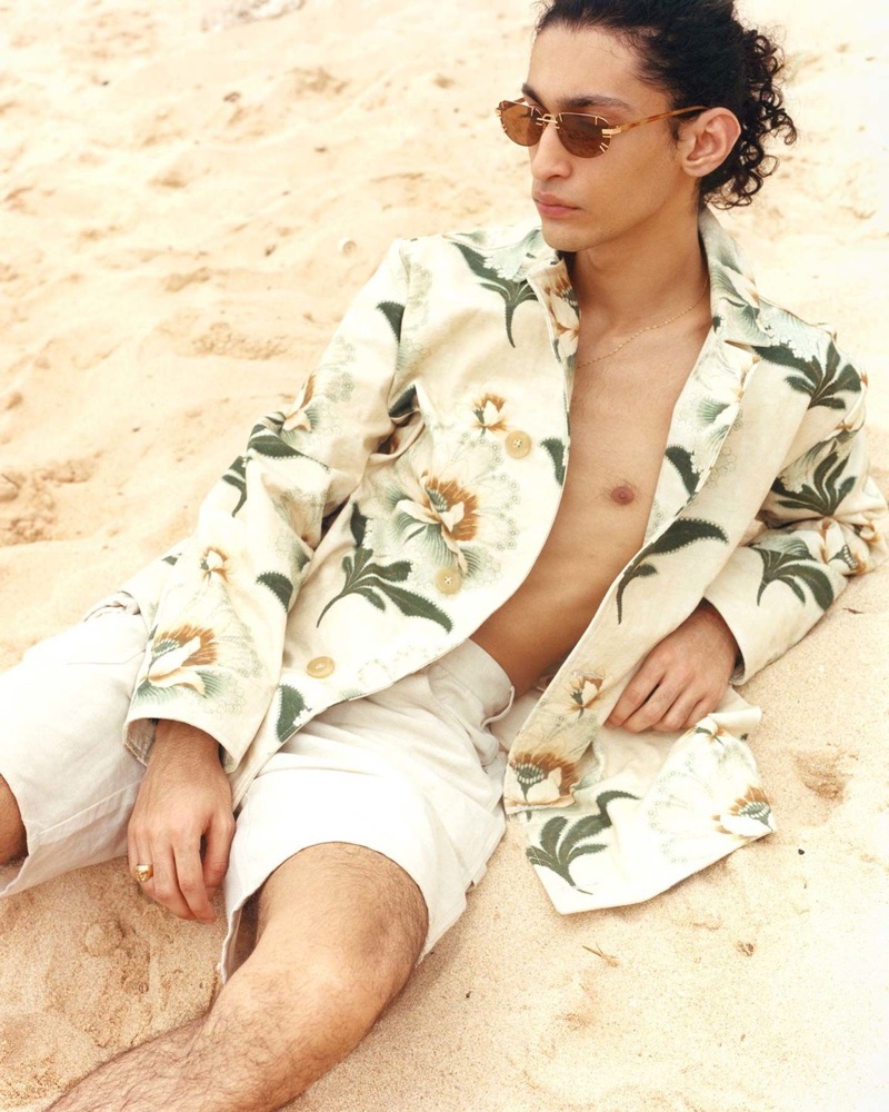Taking to the beach, Sami Younis wears a By Walid jacket, JAcquemus shorts, and Linda Farrow x Y/Project sunglasses for Browns' spring-summer 2019 campaign. 