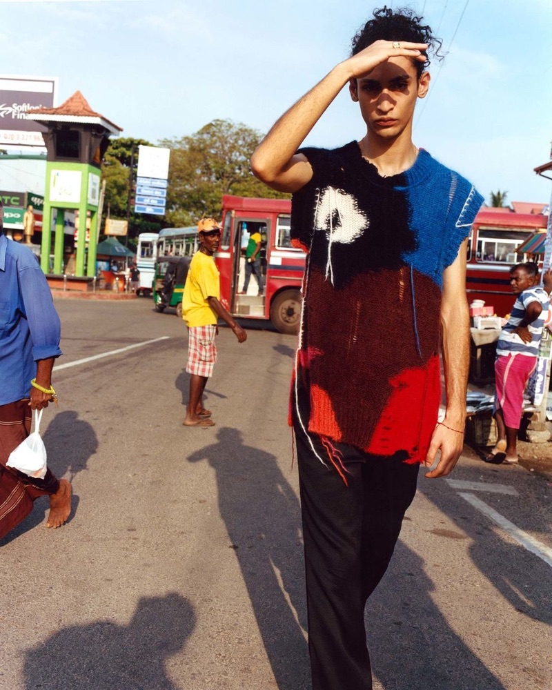 Exploring Sri Lanka, Sami Younis dons an Alexander McQueen sweater vest with Mackintosh trousers for Browns' spring-summer 2019 campaign.