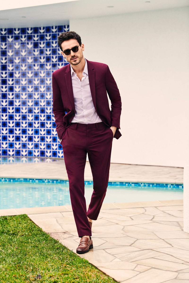 Dressed in a burgundy suit, Arthur Kulkov stars in Burton's spring-summer 2019 campaign.