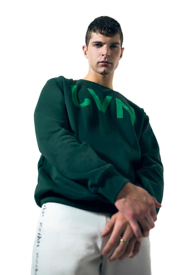 Sporting a sweatshirt and joggers, Davide wears Jovån.