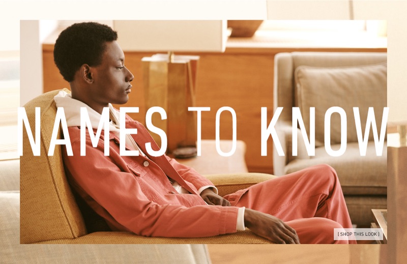 Connecting with East Dane, Youssouf Bamba  wears a look by Wood Wood.