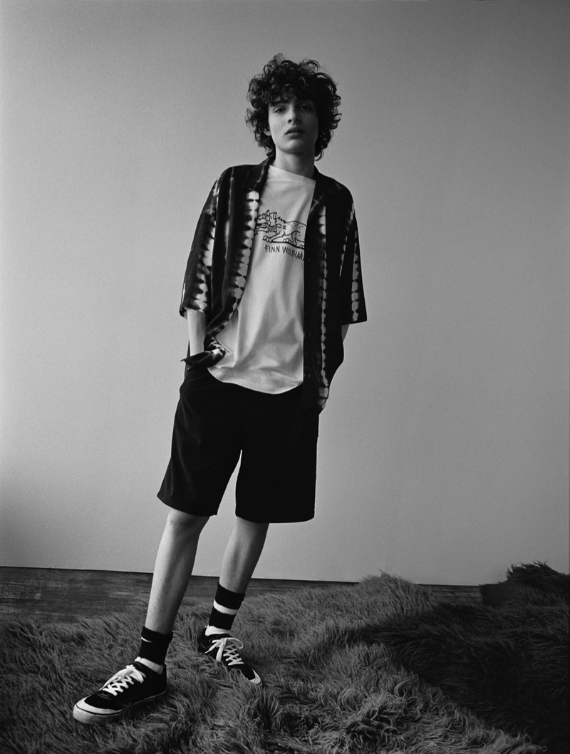 Appearing in a black and white photo, Finn Wolfhard rocks a look from his Pull & Bear capsule collection.