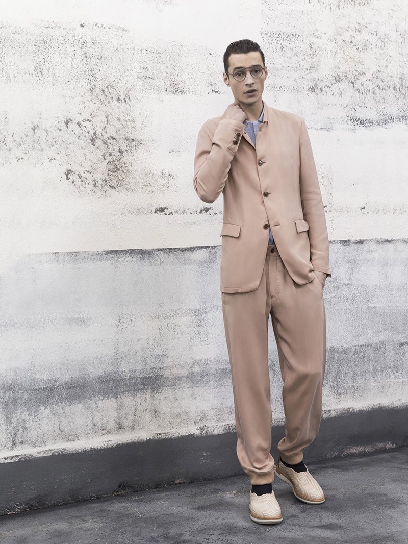 French model Adrien Sahores dons a sleek monochromatic number from Giorgio Armani.