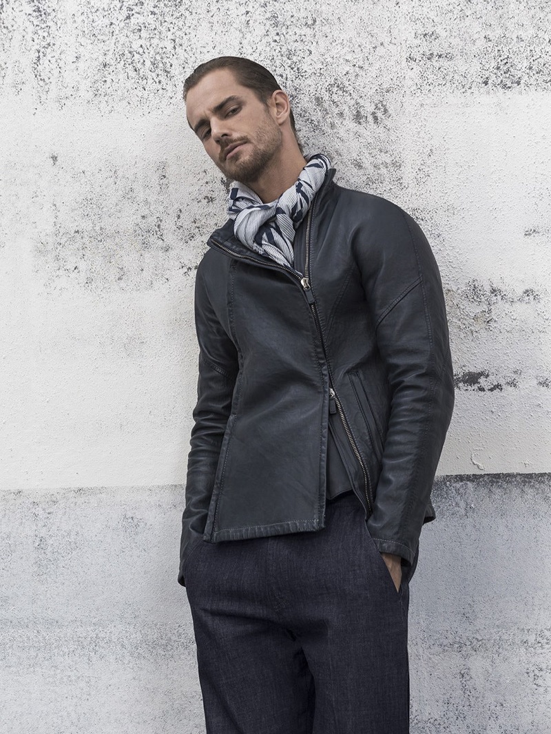 Maxime Daunay sports a leather jacket and trousers from Giorgio Armani.