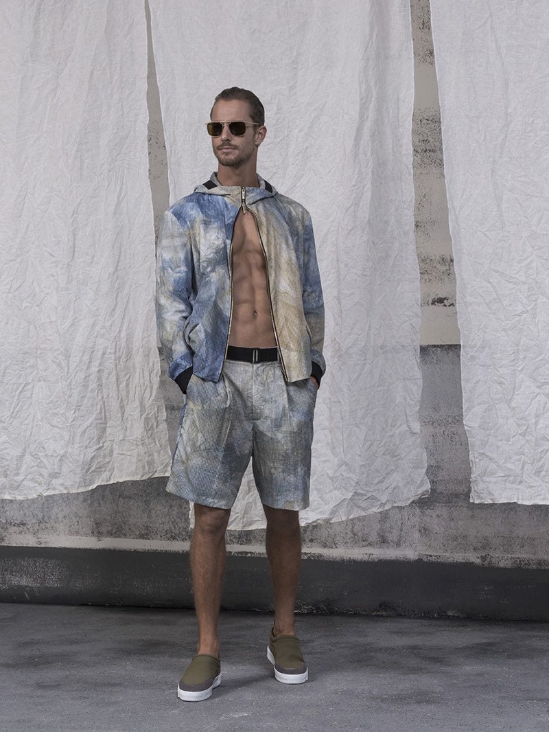 Donning a tie-dye look, Maxime Daunay wears Giorgio Armani.