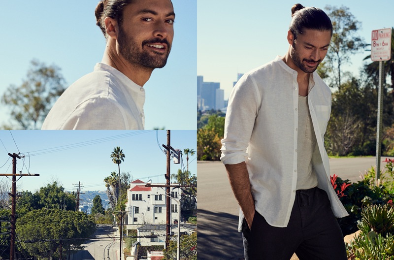 Wellness coach Crosby Tailor wears a white henley shirt from H&M.