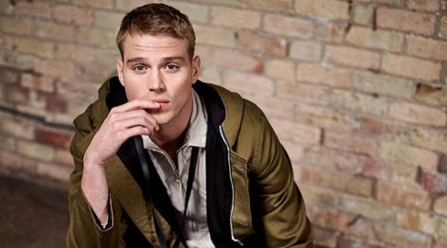 The New Utility: Matthew Noszka Dons Military-Inspired Style for Holt Renfrew Embracing military-inspired style, Matthew Noszka dons an AMIRI parka, Stone Island overshirt jacket, Junya Watanabe cargo pants, a Valentino Garavani VLTN leather pouch, and Rick Owens leather army boots.