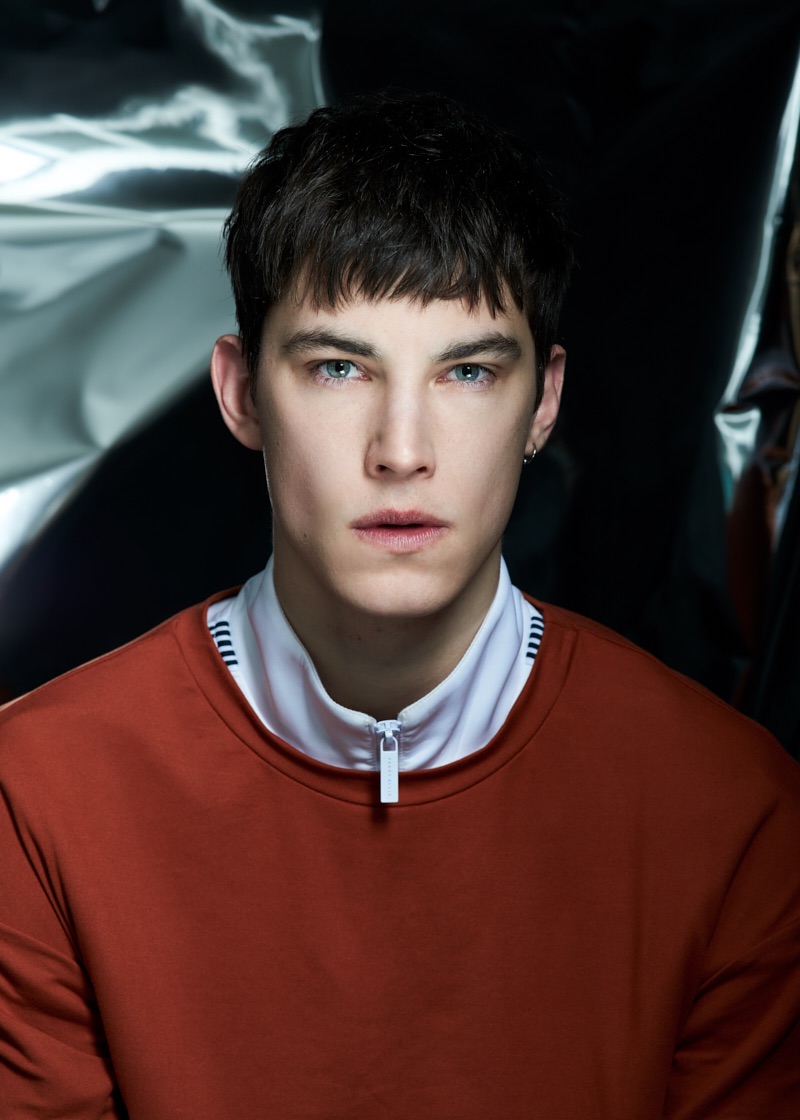Julian wears top Oak and track jacket Perry Ellis.