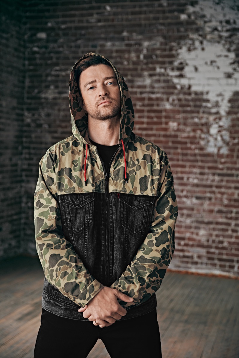 Going sporty, Justin Timberlake dons a Levi's Fresh Leaves hybrid hooded trucker jacket.