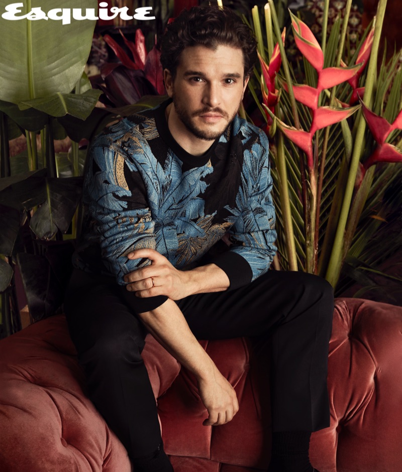 Actor Kit Harington wears a sweater and trousers by Salvatore Ferragamo.