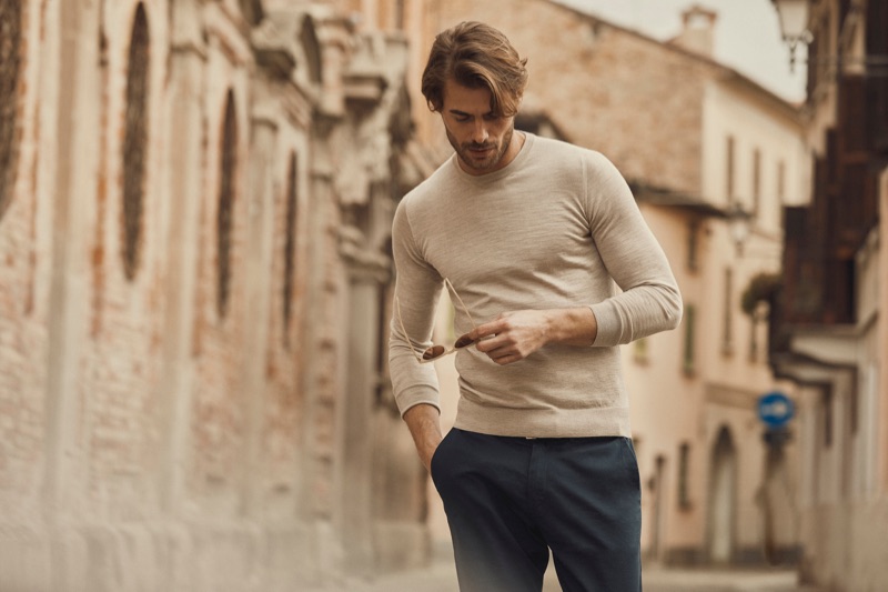 A casual but smart vision, Jacey Elthalion wears a fine-silk cashmere crewneck by Luca Faloni.