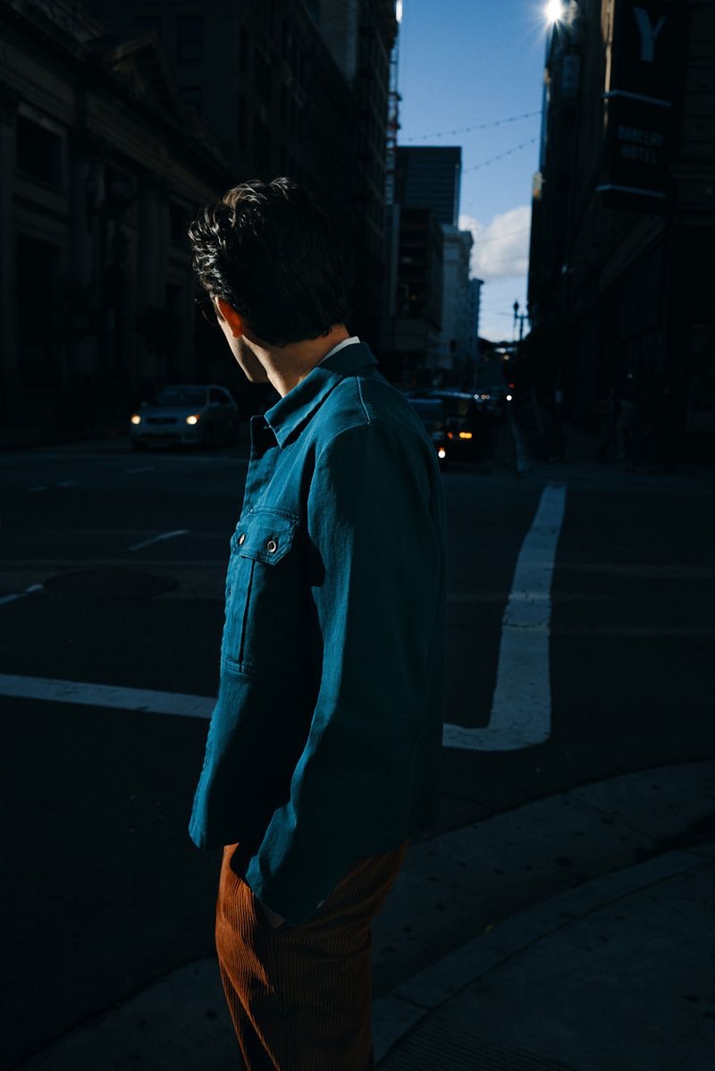 Taking to the city street, Mark Ronson sports a Barena overshirt with Séfr corduroy trousers.