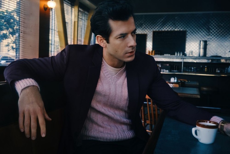 Mark Ronson dons a Prada wool suit with a ribbed Tom Ford sweater and cotton-jersey t-shirt.