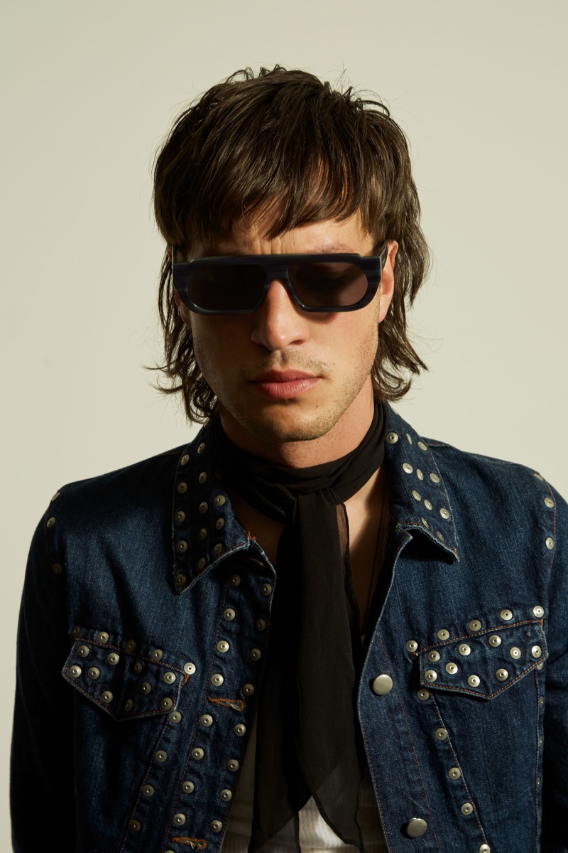 Karen Walker taps Marlon Williams to appear in its Monumental collection. He wears the brand's Turing sunglasses.