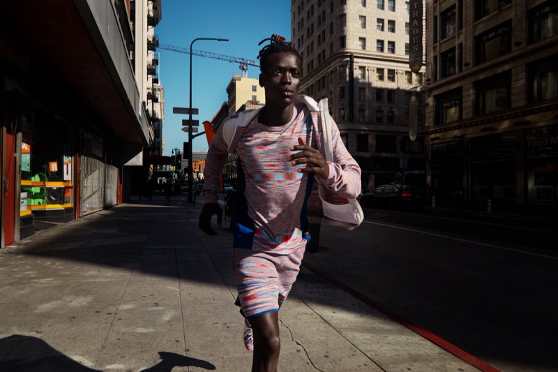 On the move, Prince Del sports activewear from the Adidas x Missoni collaboration.