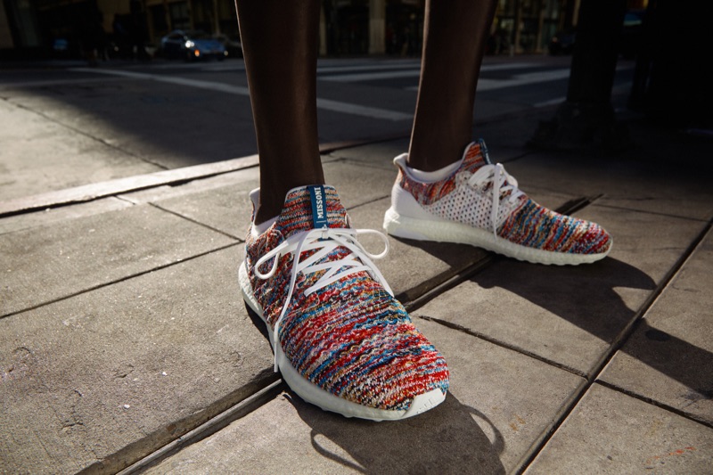 Prince Del wears running shoes from the Adidas x Missoni collaboration.